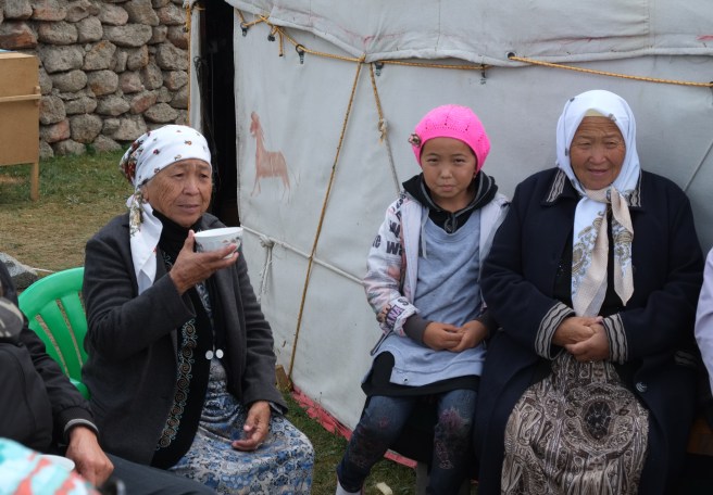 Enjoying Kyrgyz hospitality: invited by a family on vacation at Song Köl