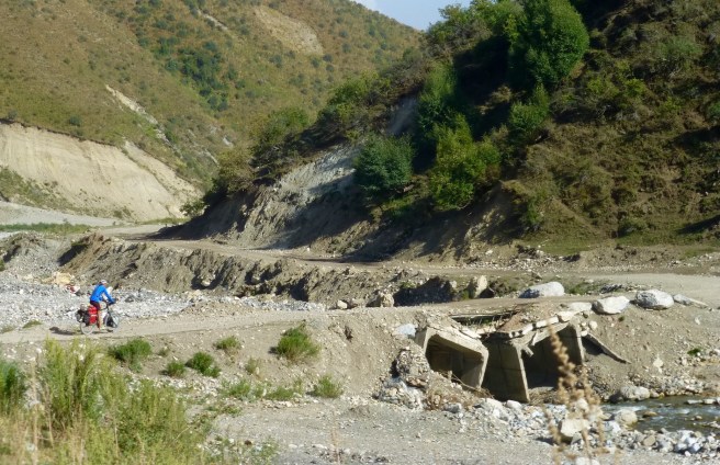 One of the many broken bridges we and many heavy trucks are passing