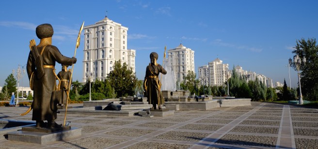 Another view of the Independence Monument with residential homes in the background