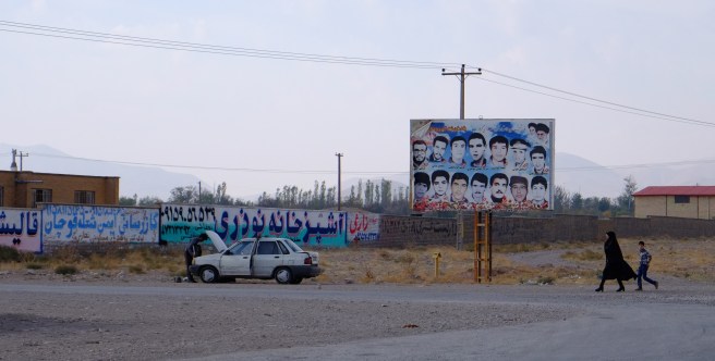 A woman - finally! And a billboard with men that died in the Irak war. You will find these pictures at the entrance of every village and town in Iran.