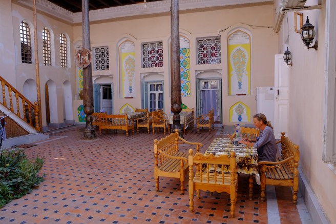 Working at our 12-Dollars-per-night-including-breakfast guesthouse