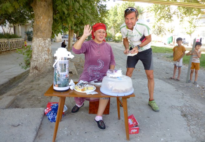 This lady is selling home-made cakes and Nescafe - a cyclist's heaven!