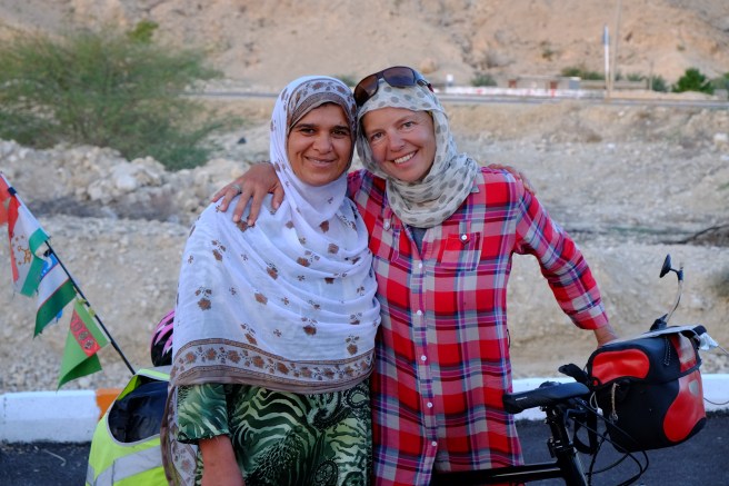 Suddenly the women wouldn't wear merely black and I looked much less like a bird of paradise