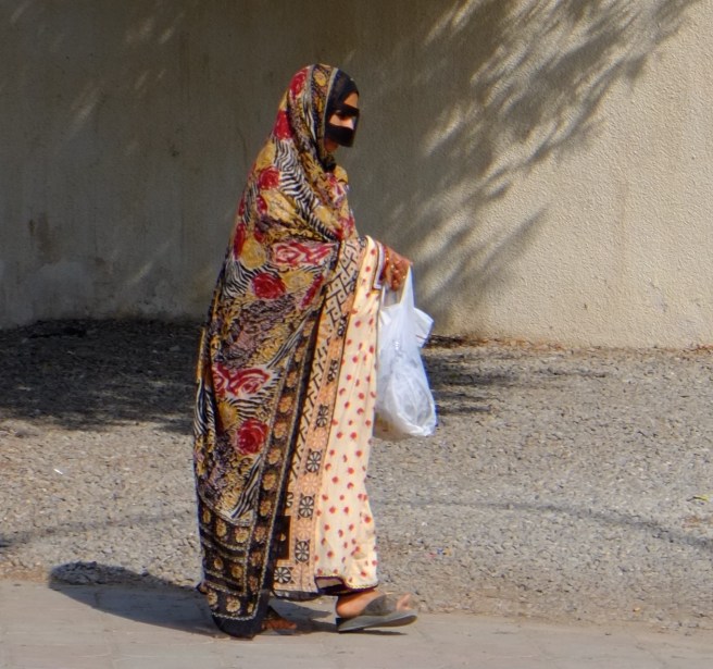 It is hard to see women on the streets and even harder to take a photo of them 