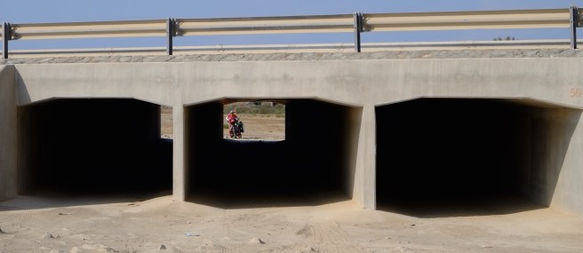 A very common way to cross highways - not just for cyclists but everything that fits through